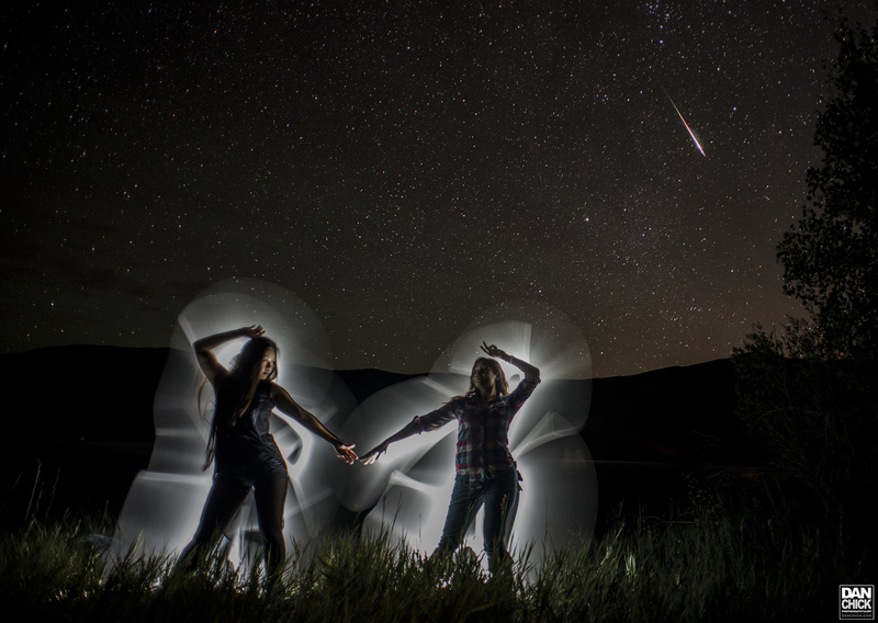 Nancy and Theresa dancing under a meteor in Colorado